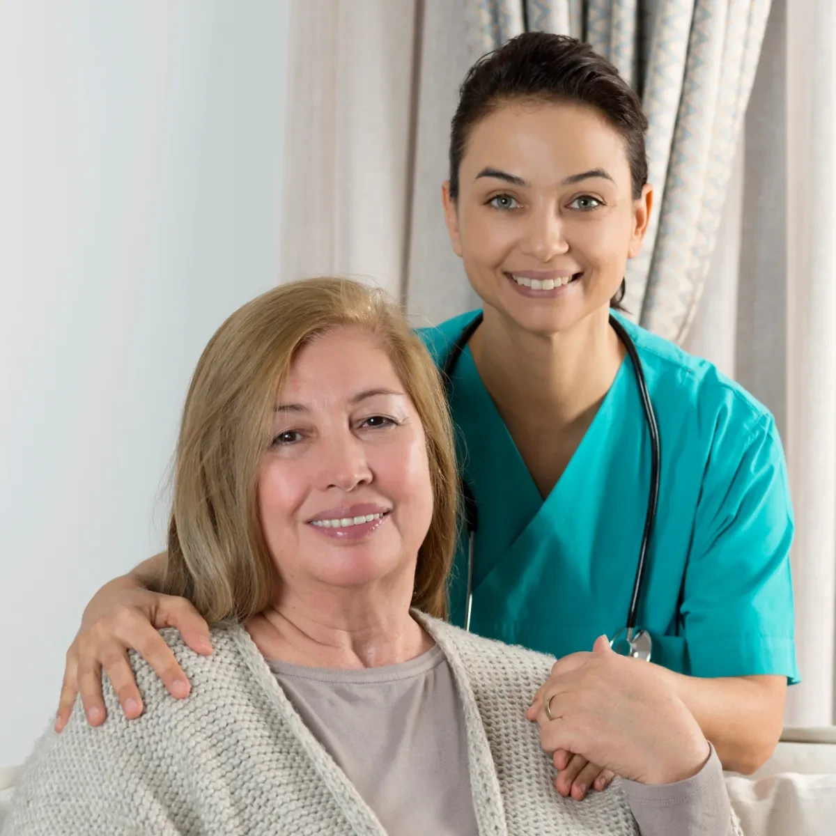 Healthcare professional with elderly patient